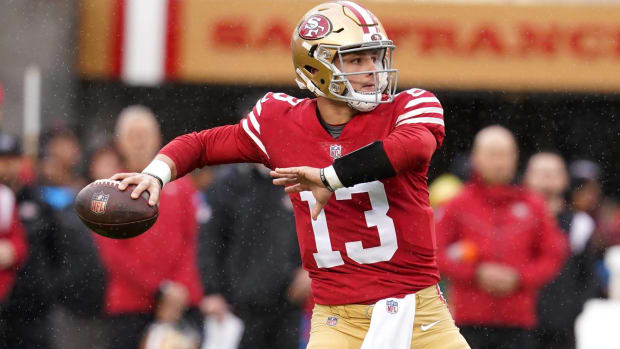 49ers quarterback Brock Purdy moves up six rounds in SI's re-draft of the 2022 NFL draft.